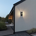 Konstsmide LED Aussenwandleuchte TRANI, E27, IP44, mit D�mmerungssensor, schwarz/Glas klar