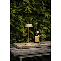 Konstsmide battery table lamp MENTON USB IP54, sand coloured, lacquered dimmable