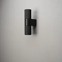 Konstsmide outdoor wall luminaire TEMI up / down, cylindrical GU10 IP54, black dimmable